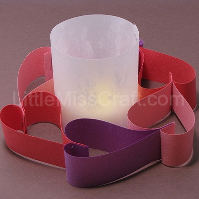 Heart tea candle made with LED candles, construction paper and staples! For Valentines Day, weddings or birthdays!