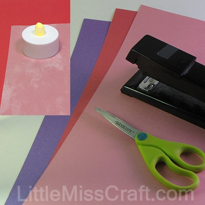 Heart tea candle made with LED candles, construction paper and staples! For Valentines Day, weddings or birthdays!
